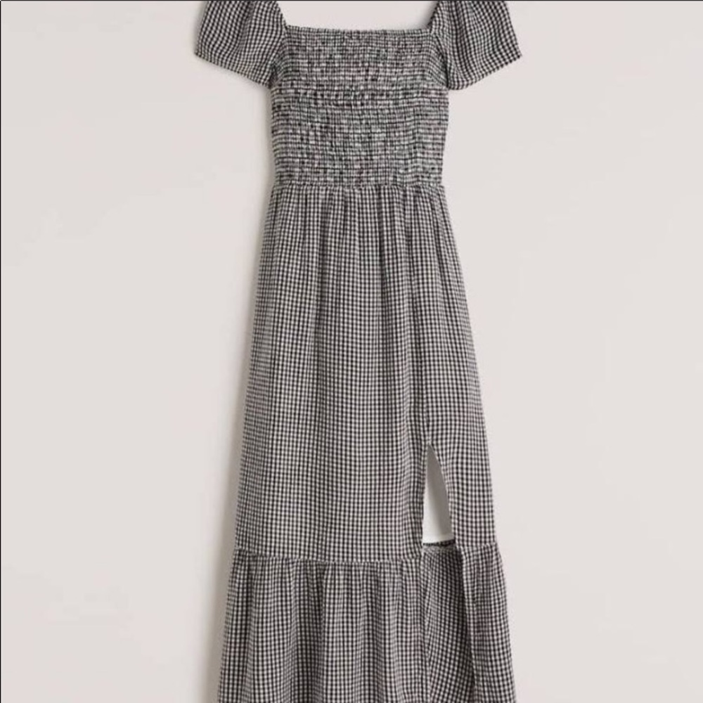 Off the shoulder dress, with slit on the side.